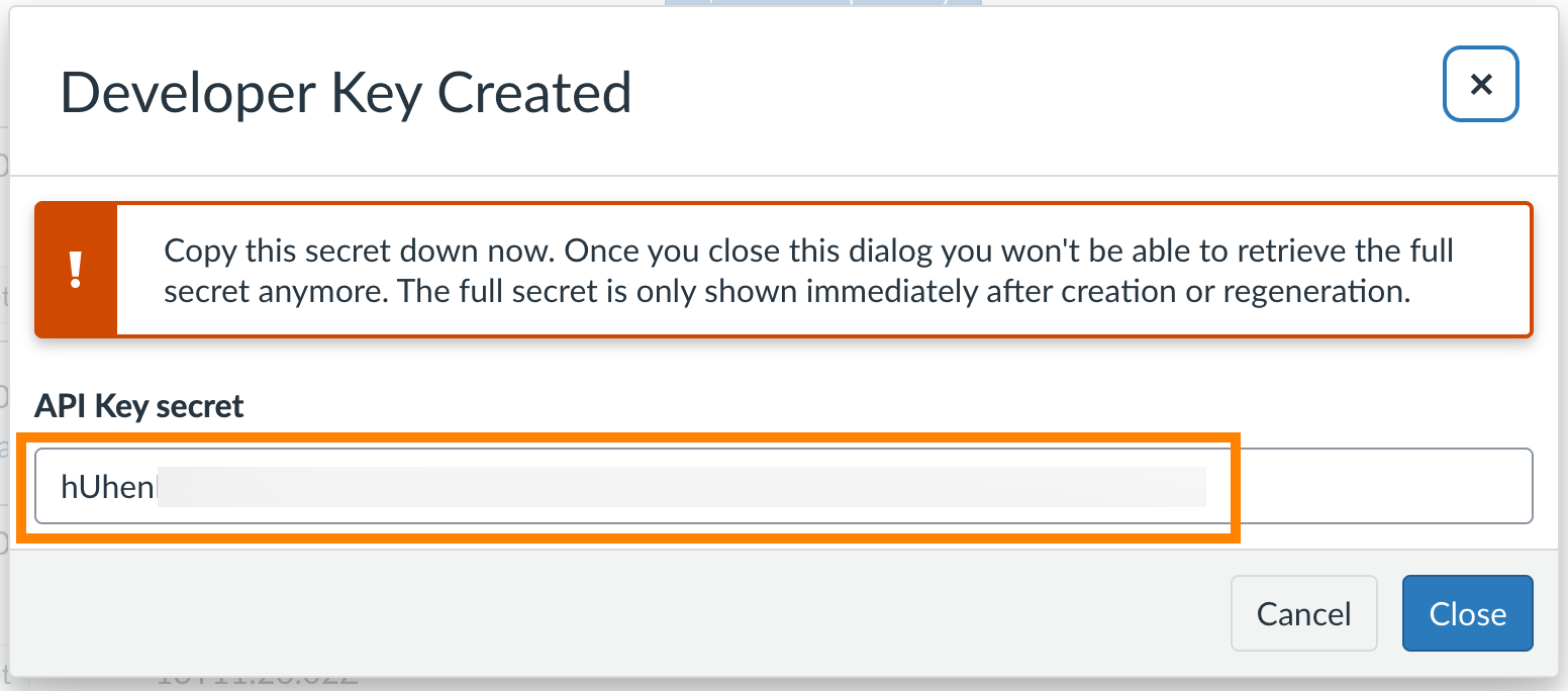 Dialog box titled "Developer Key Created" with a warning to copy the secret now, and a partially obscured API Key secret displayed in a text field plus "Cancel" and "Close" buttons.